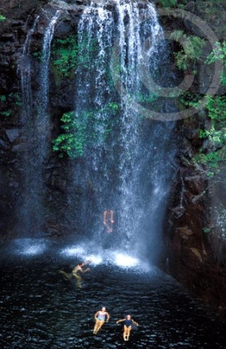 Photo of people swimming in a waterfall in Northern Territory, Australia